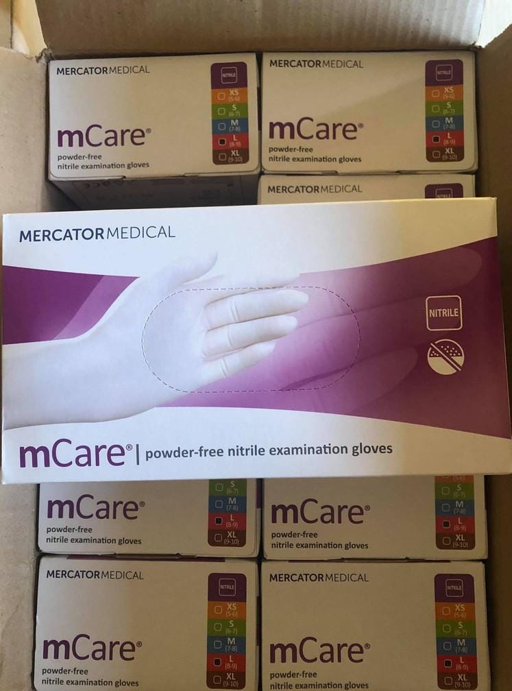 MCare Powder Free Nitrile Examination Gloves from Kubendiran International